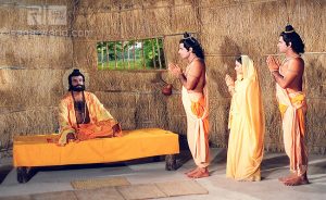 Sage Sootikshna is meditating while Ram,Lakshman and Sita standing before him